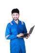© Creativa Images - Young mechanic holds laptop