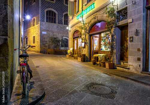 Night view of narrow street in Florence, Tuscany. Italy
