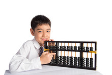 Little Boy Using Abacus To Study Mathematic Education Class