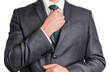 © andriano_cz - Businessman in black suit adjusting his tie