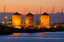 Windmills In The Port Of Rhodes, Greece