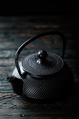 black cast iron teapot