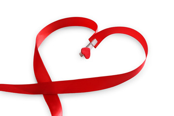 Wall Mural - red satin ribbon in heart shape, valentines day love concept.