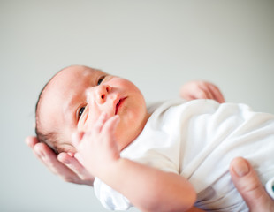 Wall Mural - Newborn baby first in arms