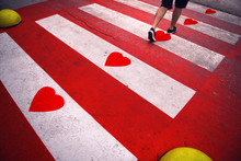 Conceptual Pedestrian Crossing With Illustrated Red Heart Shapes On The Floor.