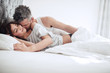 © Jacob Lund - Intimate young couple on bed