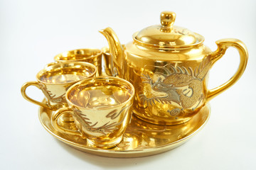 Tea in luxury golden dragon teapot set