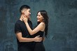 © master1305 - Portrait of smiling Korean couple on a gray