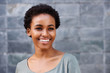 © mimagephotos - Close up smiling young black female fashion model
