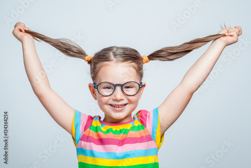 Funny Cute Little Girl Playing With Her Hair Buy This Stock