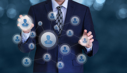 Wall Mural - Businessman manage personnel in the network.