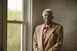 © Erickson Stock - Portrait of an old man by a window.