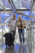 © Rawpixel.com - Senior couple traveling airport scene