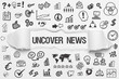 © magele-picture - Uncover News / weißes Papier mit Symbole