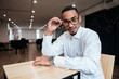 © Drobot Dean - Attractive african businessman looking at camera