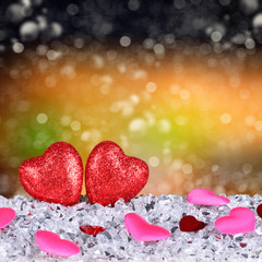 The two red hearts shapes on abstract dark bokeh background in love concept for valentines day and romantic moment