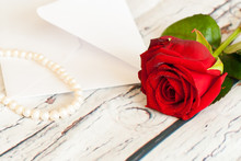 Beautiful Red Rose String Of Pearls And Letter Envelope Love Valentine's Day Concept