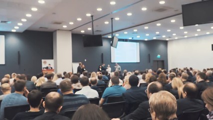 the speaker tells the speech at conference. business people seminar conference meeting office traini
