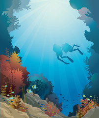 Wall Mural - Coral reef, underwater cave and divers.