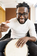 © santypan - Musician Playing Drum.