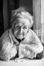 Black And White Portrait Of An Old Woman. Elderly.