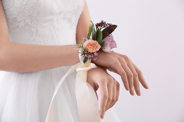 Wall Mural - Beautiful boutonniere on female hand, closeup