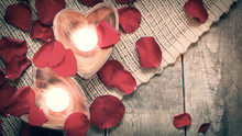 Two Enlightened Candles In Heart-shaped Candleholders With Rose