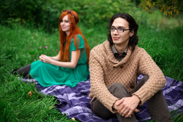 Young couple resting at the nature outdoors