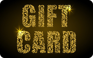 Wall Mural - GIFT CARD. The inscription created from a floral ornament. Letters with gold glitter and sparks on a black background.