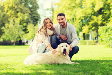 Poster - happy couple with labrador dog walking in city