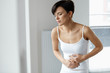 © puhhha - Pain In Stomach. Beautiful Woman Feeling Abdominal Pain. Health