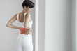 © puhhha - Pain. Beautiful Female Having Painful Feeling In Back, Backache