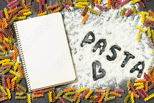 Download Blank Notepad On Black Chalkboard With Flour And Color Pasta Mockup For Kitchen Restaurant Or Cafe Menu Top View Flat Lay Foto De Stock Adobe Stock