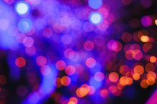 Defocused Lights. Colored Abstract Blurred Light Background. Concept Or Festival Background. Natural Background, Twinkly Lights And Stars, Christmas Tree Decoration.