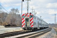 Metra Commuter Train In Elgin, Illinois On Its Journey To Chicago About 40 Miles Away. Metra Commects An Extensive Suburban Network With Chicago.