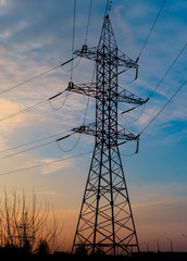 silhouette of high voltage electrical pole structure.