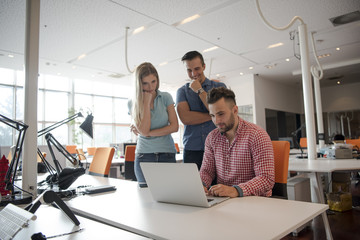 Wall Mural - Group of young people employee workers with computer