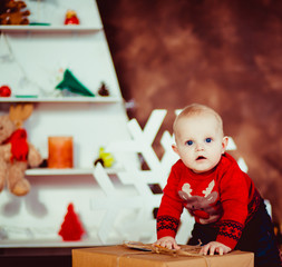 Wall Mural - Cute little boy laughing in  New Year  studio