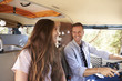© Monkey Business - Happy couple driving a camper van looking at each other