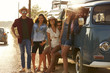 © Monkey Business - Friends in a camper van make a roadside stop, full length