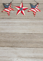 Wall Mural - USA patriotic old flag on a stars and weathered wood background
