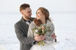 © Africa Studio - Happy wedding couple outdoors on winter day