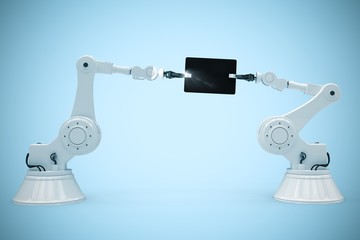 Canvas Print - Composite image of robots and digital tablet against white backg