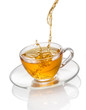 Tea flowing in cup