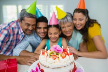 Wall Mural - Happy multigeneration family celebrating birthday party