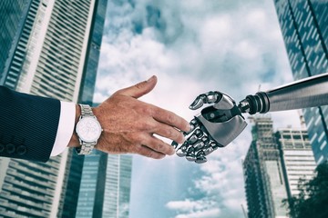 Poster - Composite image of businessman in suit clenching fists