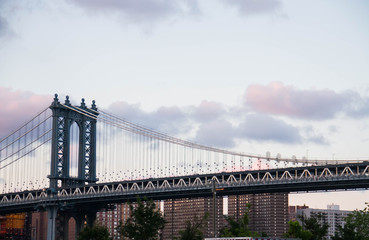 Wall Mural - Manhattan bridge, buildings and light pole before sunset, New York