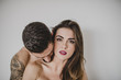 © ADDICTIVE STOCK - Man kissing girlfriend's neck