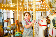 Girl Riding Carousel 