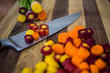 © Sarah Rypma - Assorted carrots chopped with knife
